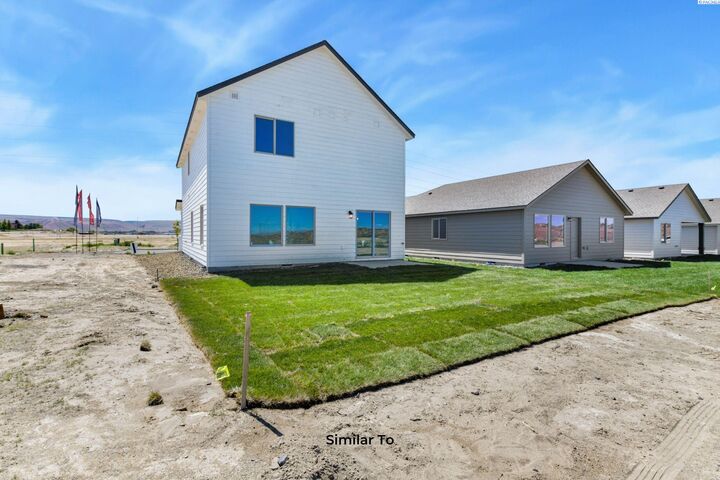 Property Photo:  710 Honeylicious St.  WA 99352 