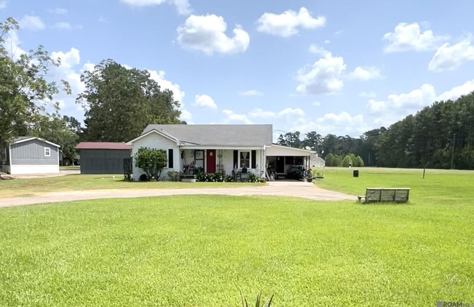 Property Photo:  30850 Walker North Rd  LA 70785 
