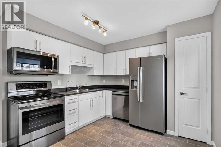 Property Photo:  711 Beacon Hill  AB T9H 3R5 