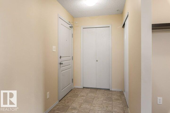 Property Photo:  #307 1188 Hyndman Rd NW  AB T5A 0E9 