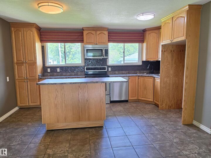 Property Photo: 3822 114 Avenue NW AB T5W 0S6
