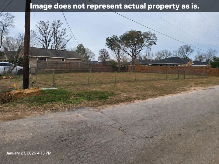 Property Photo: 206 1st Street TX 77378