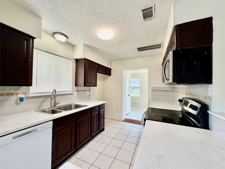 Property Photo: 2603 Quarry Hill Road TX 77478