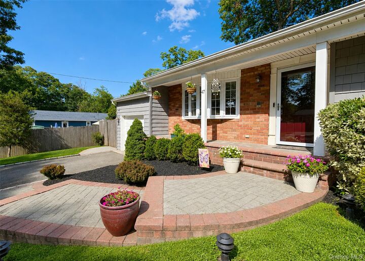 Property Photo:  47 March Court  NY 11784 
