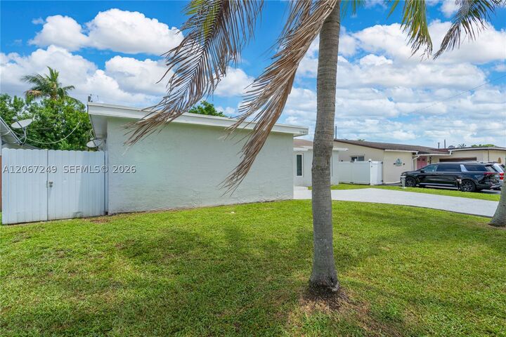 Property Photo:  11911 NW 32nd Mnr  FL 33323 