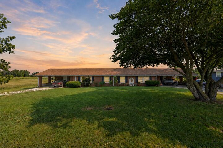 Property Photo: 7053-7057 W Farm Road 106 MO 65803