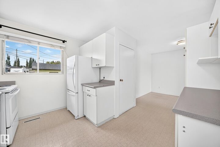 Property Photo:  9324 Ottewell Road NW  AB T6B 2C9 
