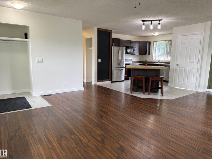 Property Photo:  7922 97 Avenue  AB T8L 3G6 