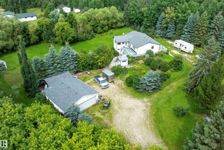 Property Photo: 52502 Rge Road 25 104 AB T7Y 2M2