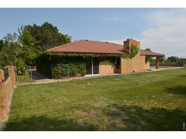 Property Photo:  10110 W 73rd Pl  CO 80005 