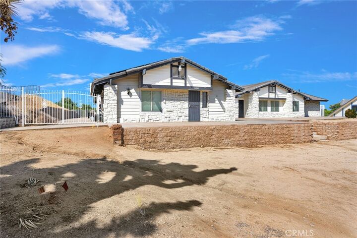 Property Photo:  14942 Riverside Drive  CA 92307 