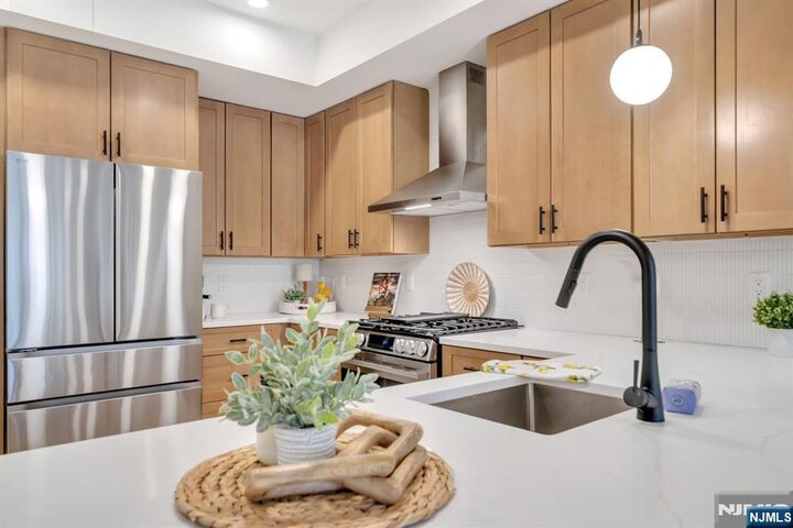 Property Photo:  20 Encampment Court 104  NJ 07045 