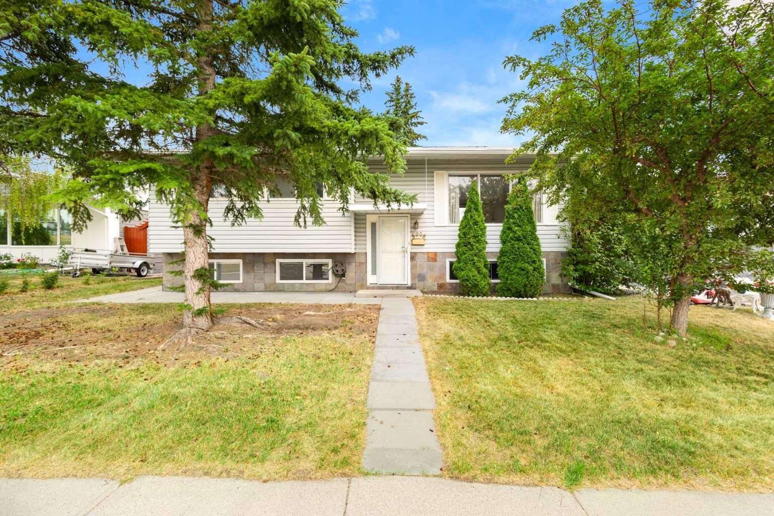 Property Photo: 6008 Dalgetty Drive NW AB T3A 1J3