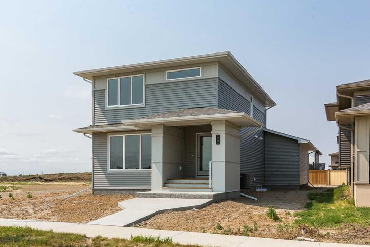 Property Photo:  320 Aquitania Boulevard W  AB T1J 5T4 