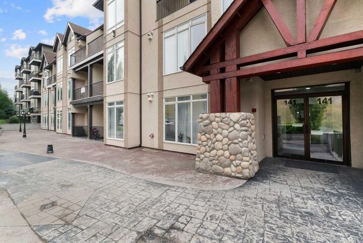 Property Photo: 141 Mountain Street 208 AB T4C 1Z5
