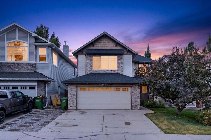 Property Photo:  2745 Coopers Manor SW  AB T4B 3J8 