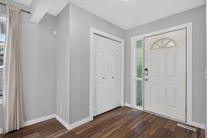 Property Photo: 56 Silver Creek Boulevard AB T4B 2P6