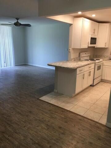 Property Photo:  1271 NW 13th Street 357E  FL 33486 