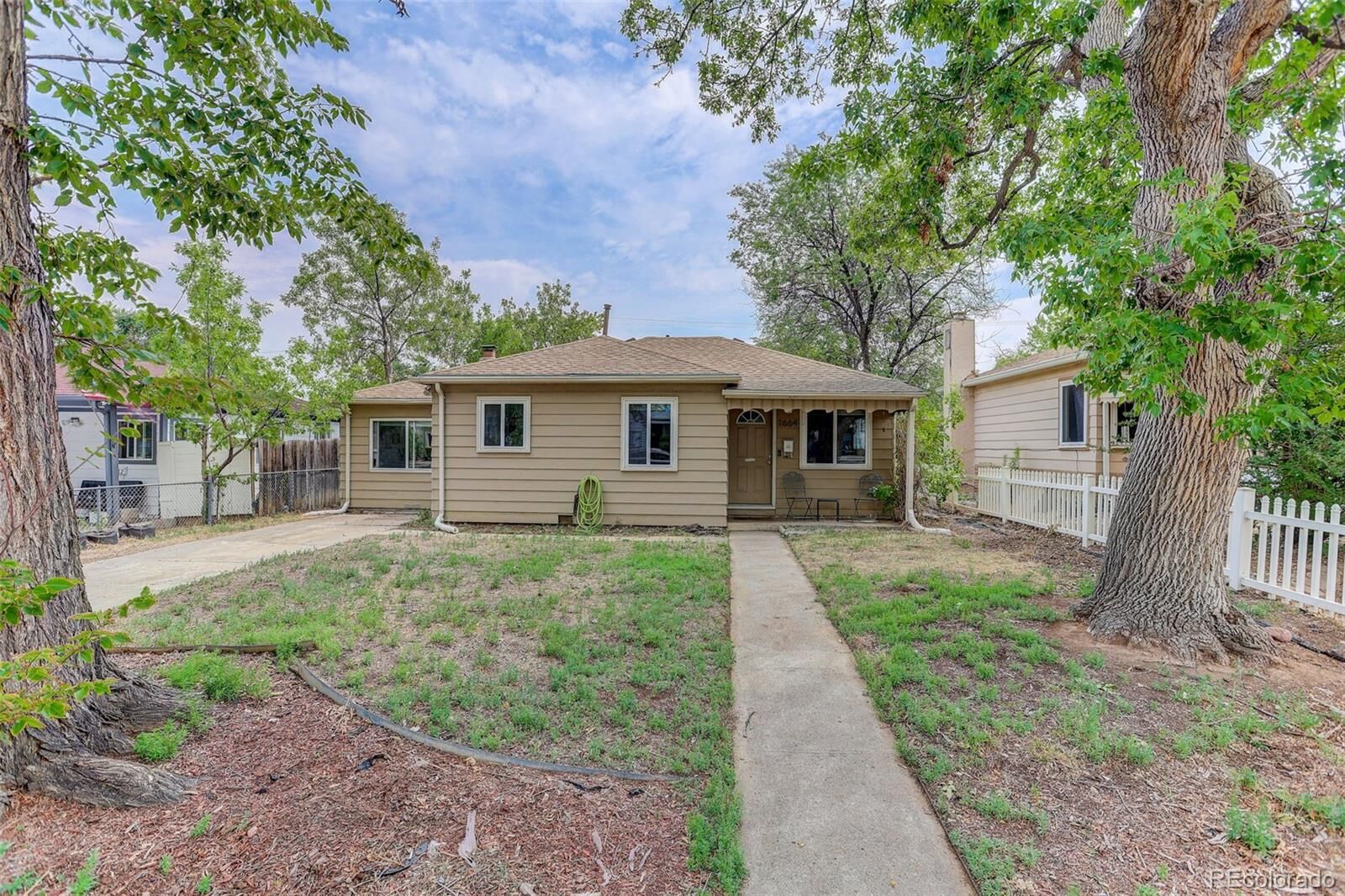 Property Photo:  1664 Ironton Street  CO 80010 