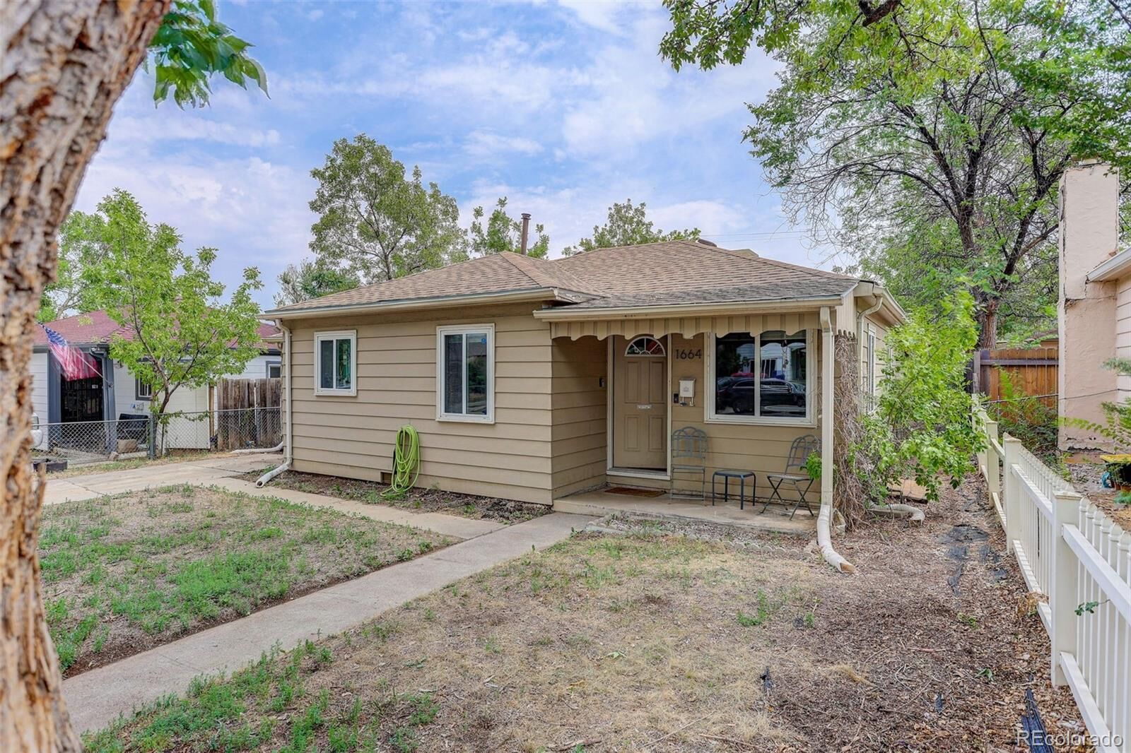 Property Photo:  1664 Ironton Street  CO 80010 
