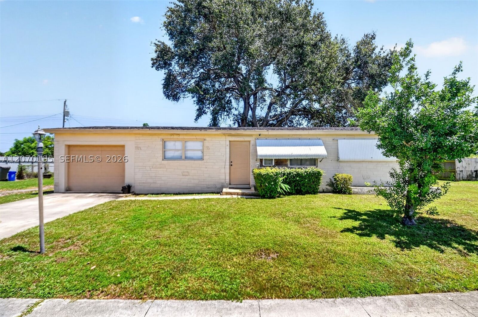 Property Photo:  1572 Woodland Ave  FL 33415 