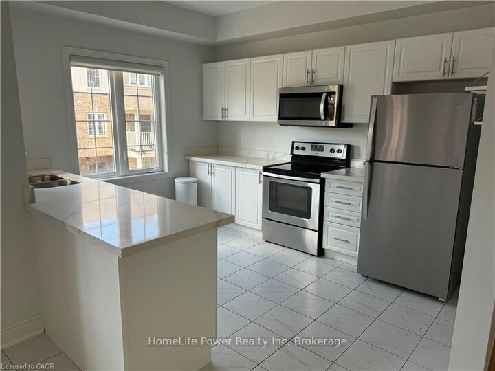 Property Photo: 88 Decorso Drive 57 ON N1L 0A9
