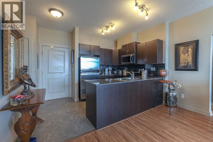 Property Photo: 11811 Lake Fraser Drive Southeast AB T2J 7J4