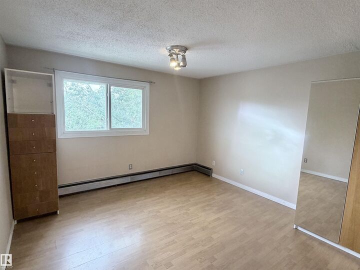 Property Photo: 11340 124 Street NW 306 AB T5M 0K1