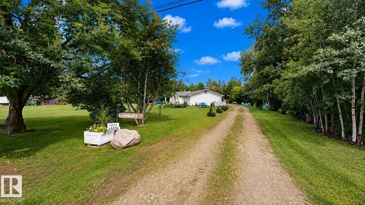 Property Photo:  10032 108 Street  AB T7P 1M9 