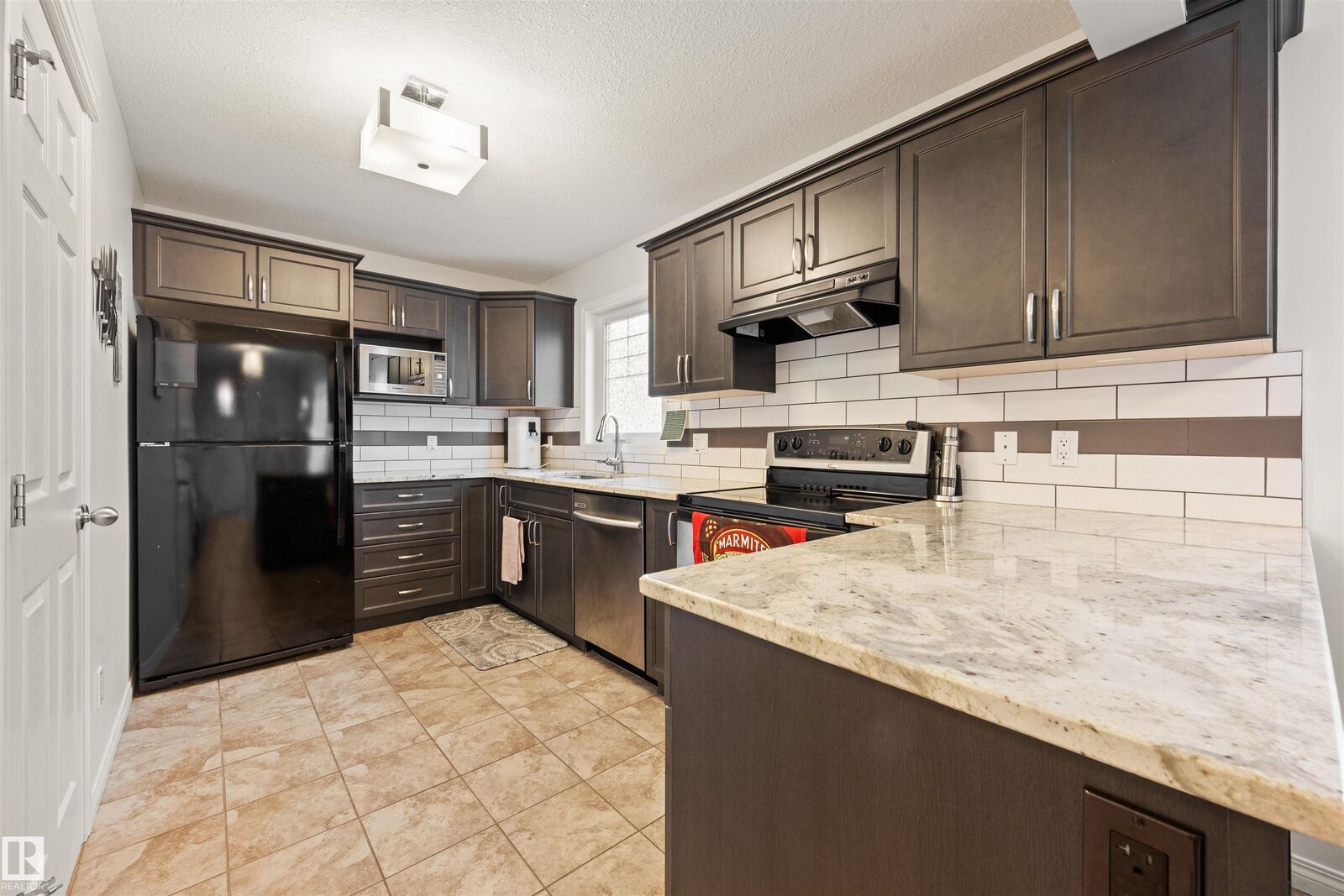 Property Photo: 12425 111 Avenue NW AB T5M 0M2