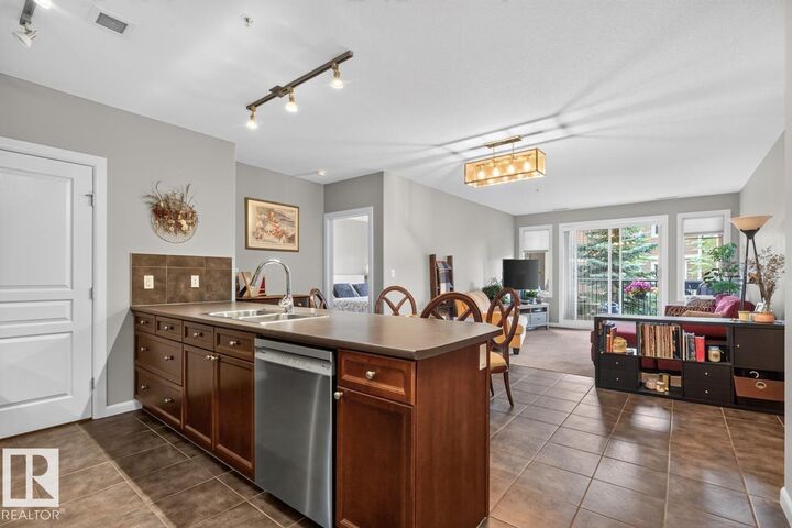 Property Photo: 501 Palisades Way 213 AB T8H 0H8