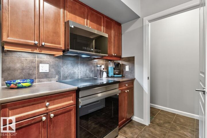 Property Photo: 501 Palisades Way 213 AB T8H 0H8