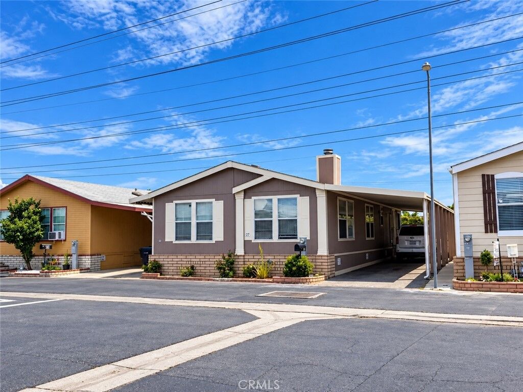 Property Photo:  16600 Downey 27  CA 90723 