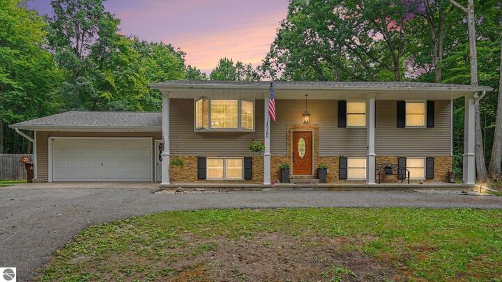 Property Photo: 760 Hiawatha Drive MI 48858