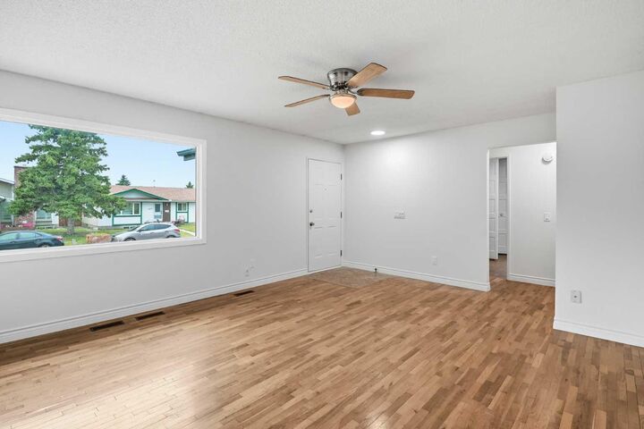 Property Photo: 1211 Maitland Drive NE AB T2A 5K2