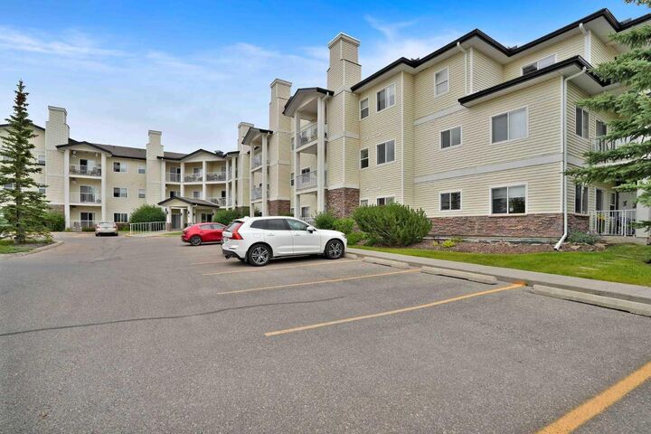 Property Photo: 72 Quigley Drive 115 AB T4C 2K6
