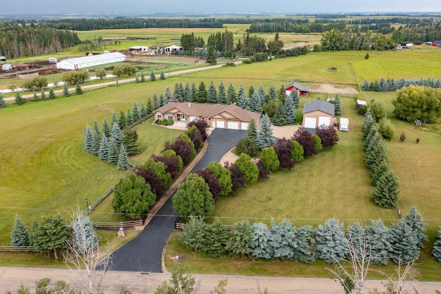Property Photo: 261066 Township Road 422 AB T4J 1R3