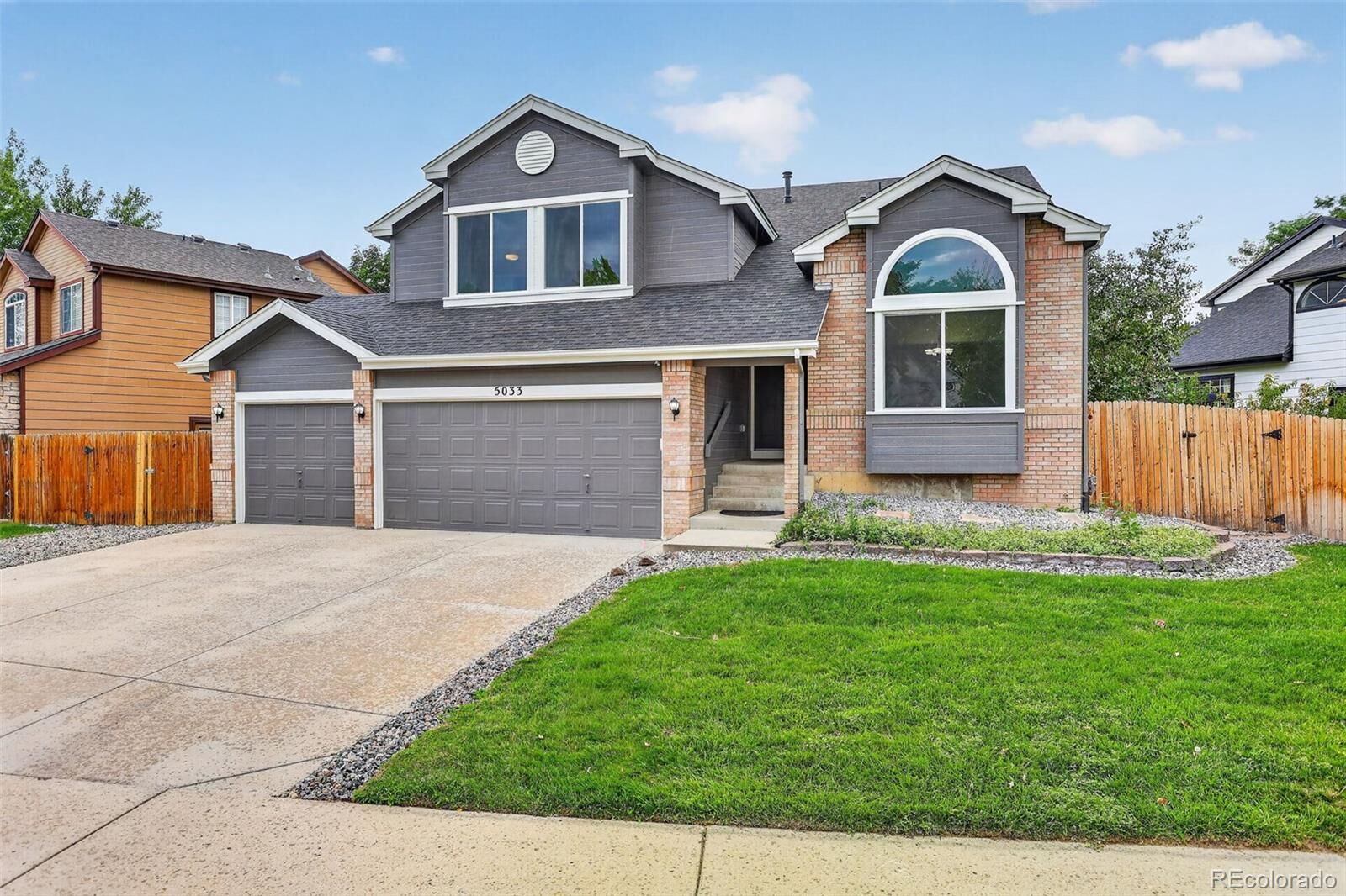 Property Photo:  5033 S Owens Street  CO 80127 