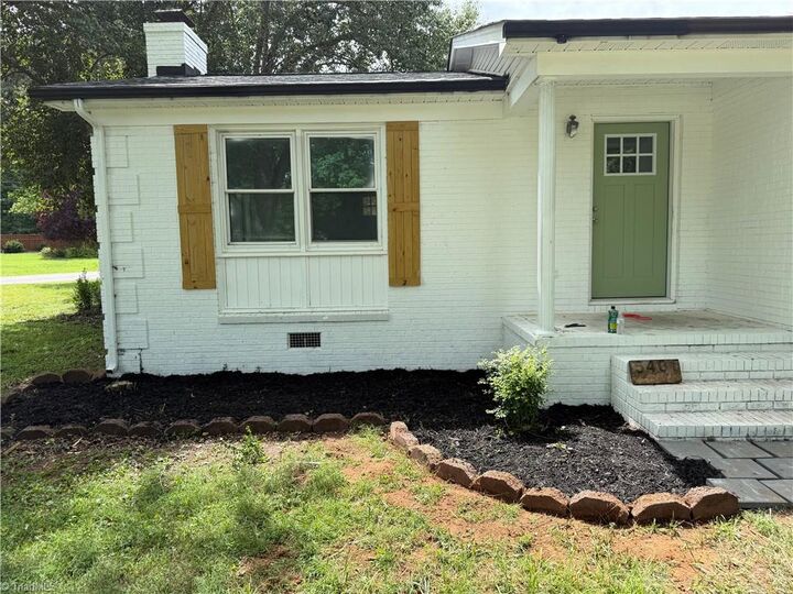 Property Photo:  5401 Yanceyville Road  NC 27214 