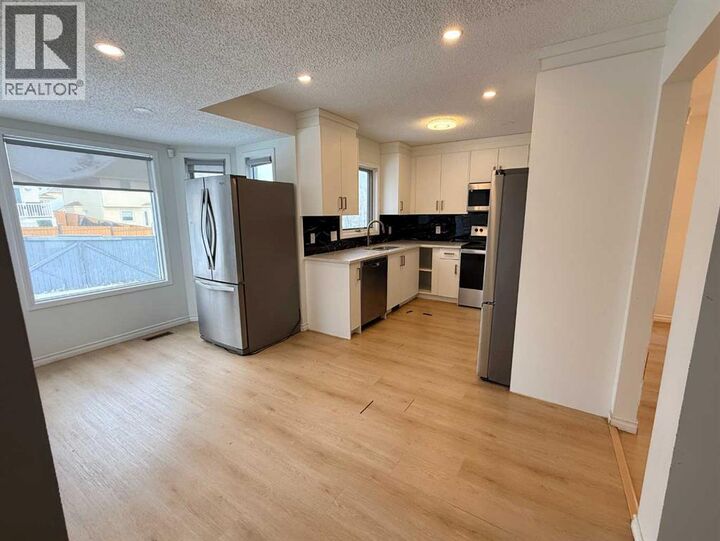 Property Photo: 651 Macewan Drive Northwest AB T3K 3R1