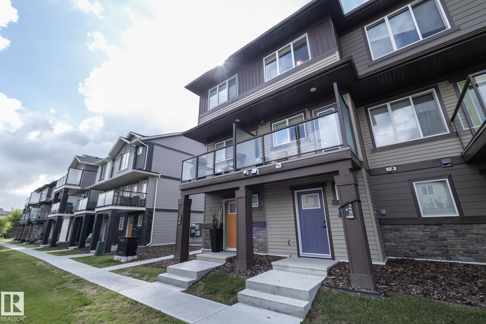 Property Photo: 1530 Tamarack Boulevard NW 28 AB T6T 2E6