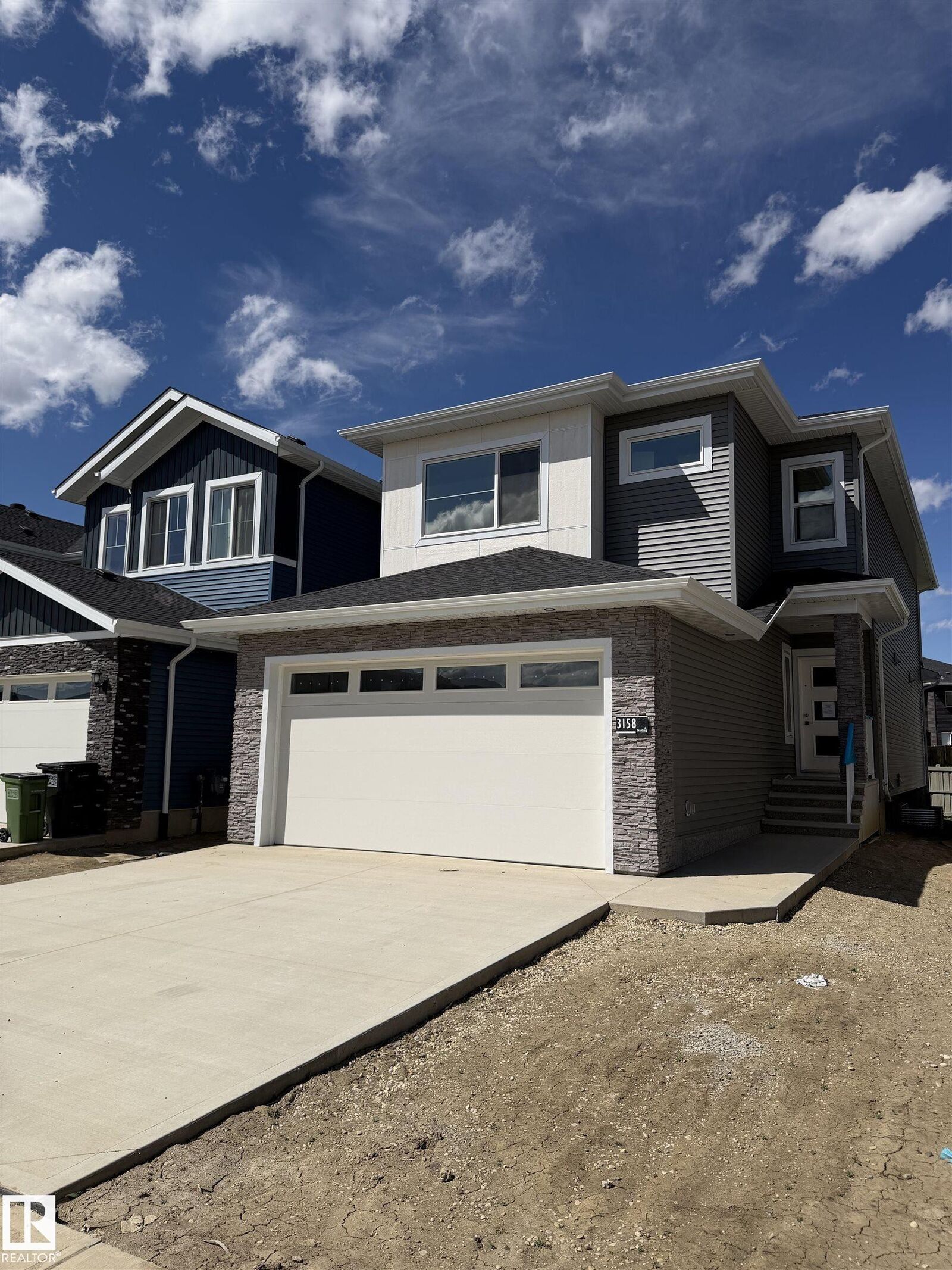 Property Photo: 3158 Magpie Way NW AB T5S 0V4