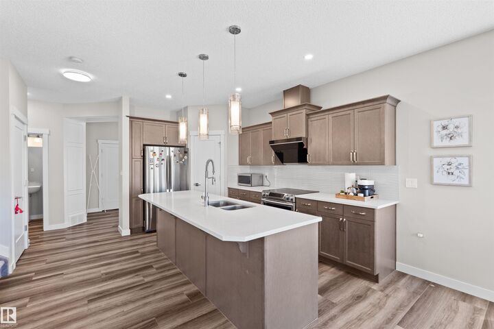 Property Photo: 4673 Alwood Way SW AB T6W 3A3