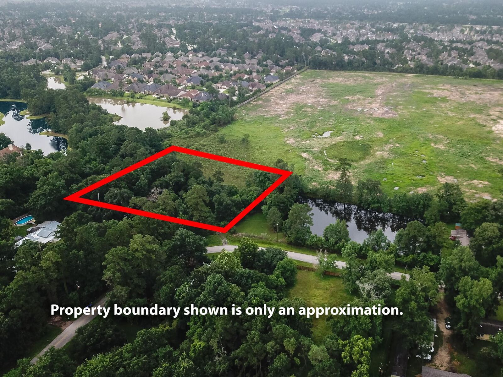 Property Photo: 8111 Rolling Oaks Dr TX 77389