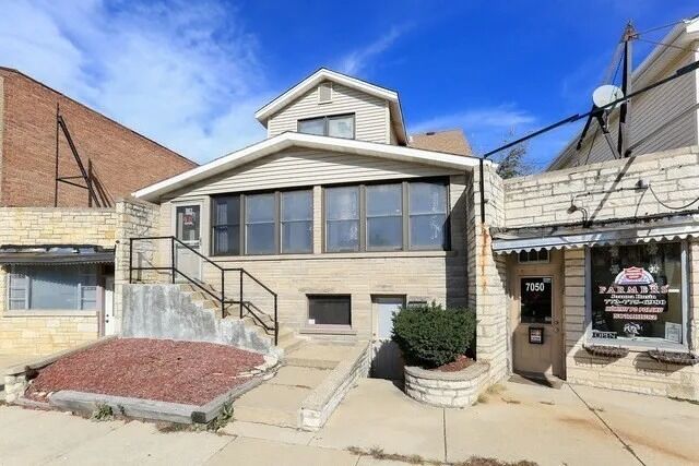 Property Photo: 7050 W Higgins Avenue 1E IL 60656