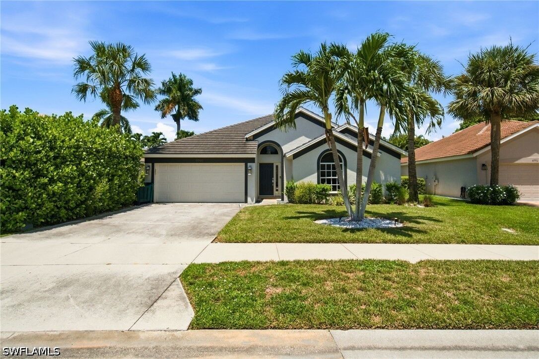 Property Photo: 6988 Burnt Sienna Circle FL 34109