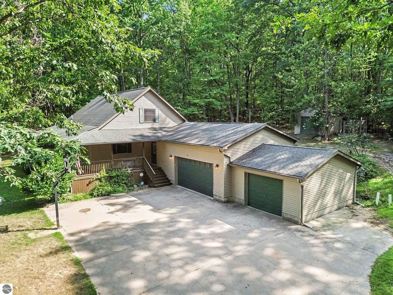 Property Photo:  722 Bungo Lake Road  MI 48625 