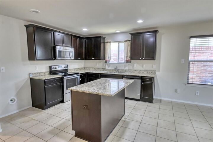 Property Photo:  433 Magma  TX 76131 
