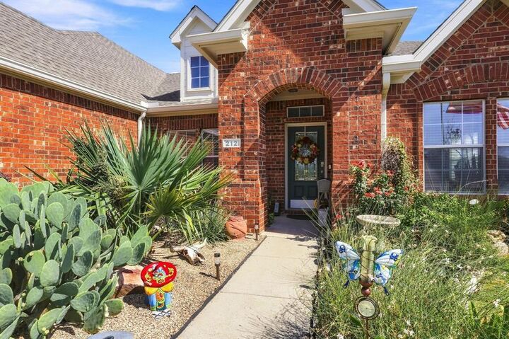 Property Photo:  212 Autry Boulevard  TX 75058 