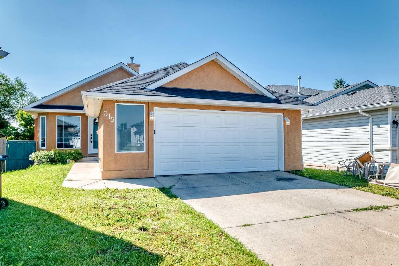 Property Photo: 315 Appleglen Place SE AB T2A 7V9